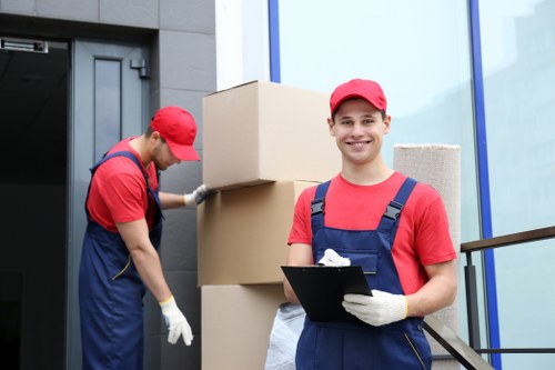 Loading household furniture into a removal van