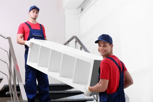 Man and van loading boxes for a Wimbledon home move