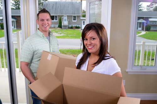 Movers handling boxes safely during a Wimbledon Man And Van service