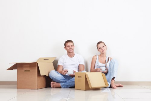 Local movers loading household furniture in Wimbledon