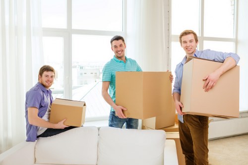 Careful unloading of furniture at a Wimbledon address